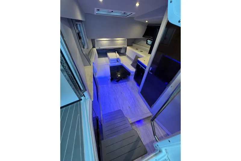 Slide: The Image of Interior of 2020 Formula 400 Super Sport Crossover with modern lighting and seating. - 8