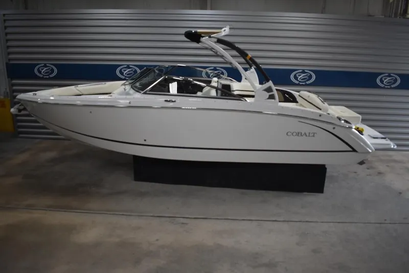 The Image of 2021 Cobalt R7 boat in showroom, side view, sleek white design. - 0