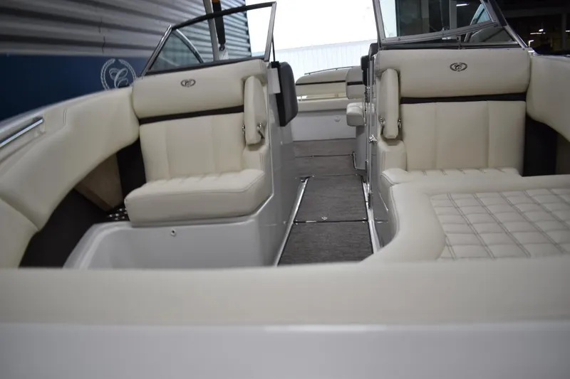 Slide: The Image of Interior of a 2021 Cobalt R7 boat with cream leather seating. - 9