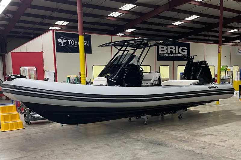 The Image of 2026 Brig Eagle 8 boat in a showroom, featuring sleek design and modern equipment. - 8