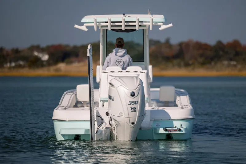 Slide: The Image of Caymas 26 HB 2026 boat with Yamaha 350 V6 engine on water. - 5