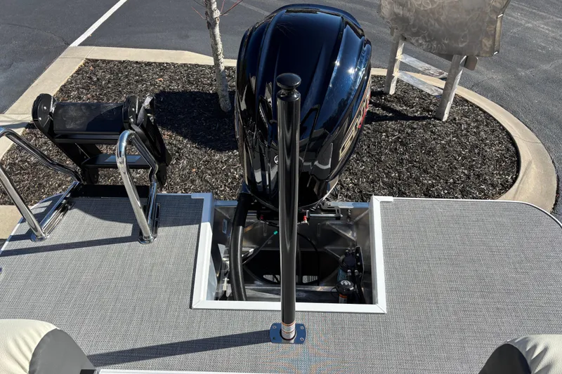 Slide: The Image of 2026 Veranda Relax VR 235 RCP boat with sleek outboard motor and swim ladder. - 5