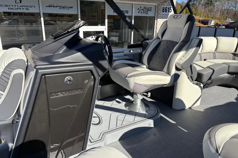 Slide: The Image of 2026 Veranda Relax VR 235 RCP boat interior with luxurious seating and modern dashboard. - 9