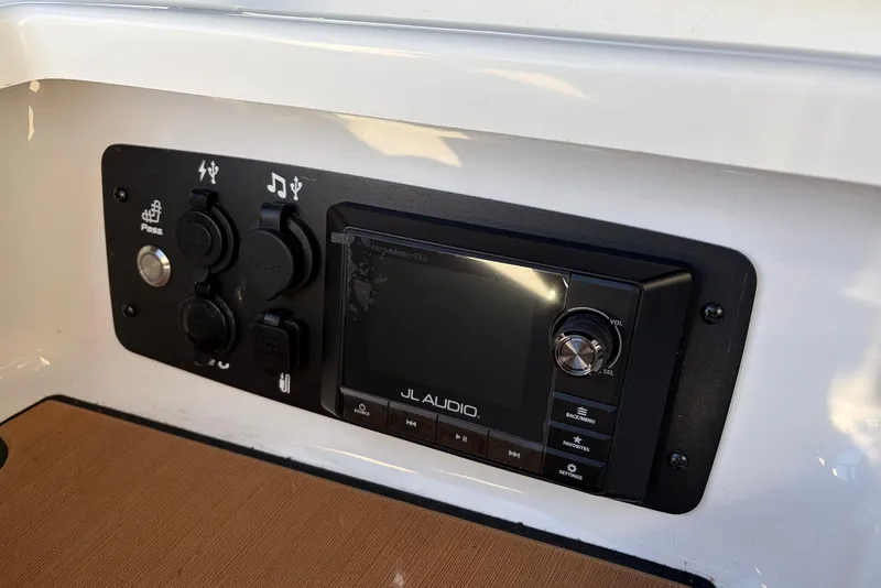 Slide: The Image of Control panel of 2021 Nautique Super Air Nautique G23 with JL Audio system. - 26