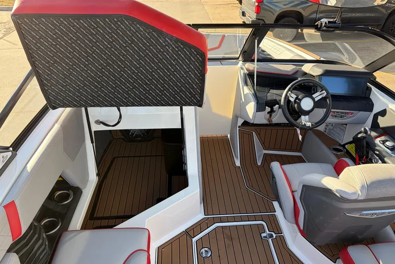 Slide: The Image of 2021 Nautique Super Air Nautique G23 interior with modern dashboard and seating. - 29