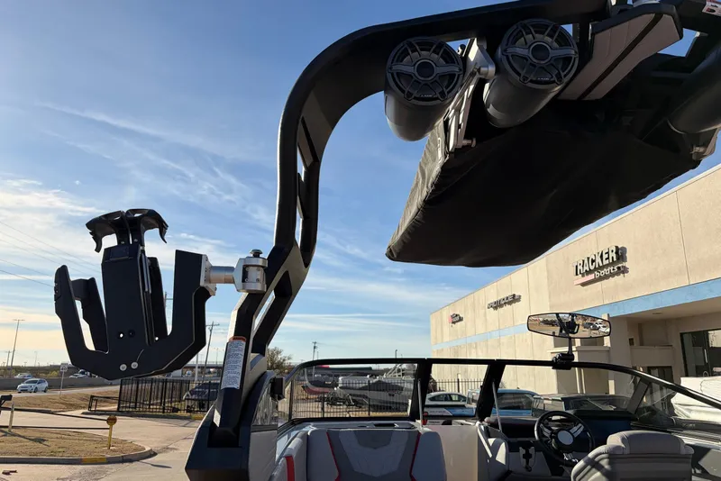 Slide: The Image of 2021 Nautique Super Air Nautique G23 boat with speakers and wakeboard rack. - 51