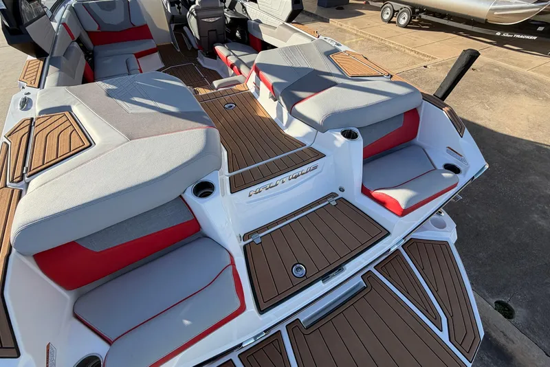Slide: The Image of 2021 Nautique Super Air Nautique G23 boat interior with stylish seating and teak flooring. - 61