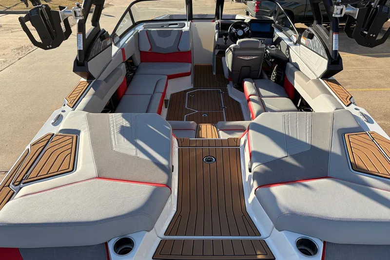 Slide: The Image of 2021 Nautique Super Air Nautique G23 interior with sleek seating and modern design. - 9