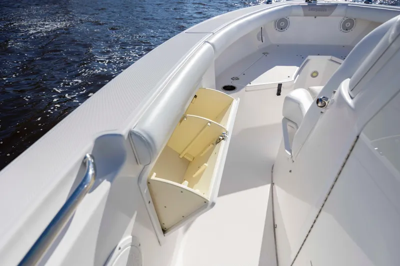 Slide: The Image of 2015 Everglades 255 Center Console boat interior with open storage compartment. - 30