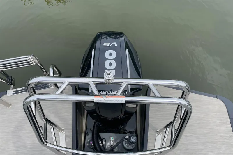 Slide: The Image of 2024 Harris Breeze 230 boat with Mercury outboard engine, viewed from above. - 7