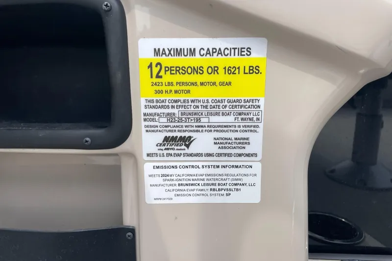 Slide: The Image of 2024 Harris Breeze 230 capacity label, 12 persons or 1621 lbs, 300 HP motor. - 8