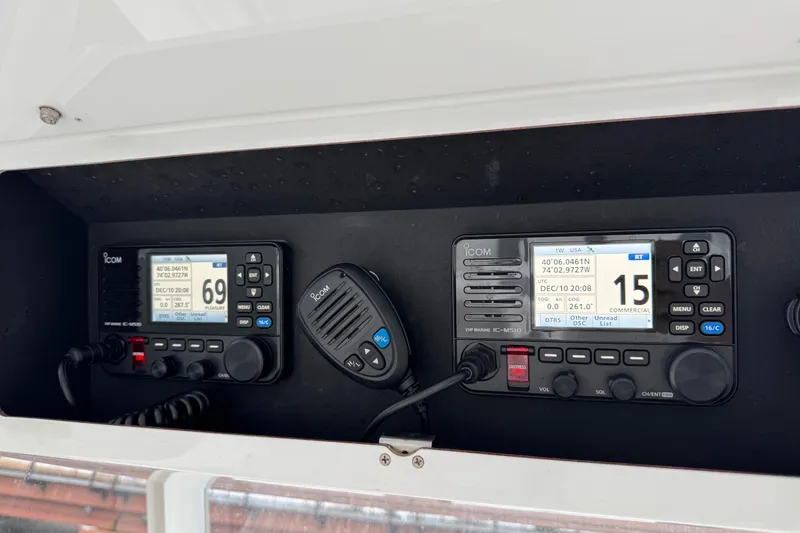 Slide: The Image of 2019 Onslow Bay 33 TE boat with Icom VHF marine radios and microphone. - 14