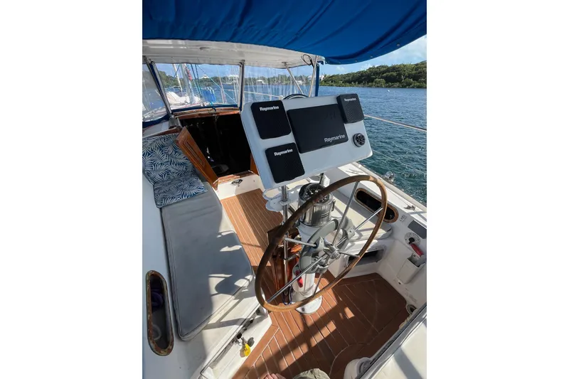 Slide: The Image of Cockpit of 1986 Catalina 36 MK1 sailboat with Raymarine navigation system. - 16