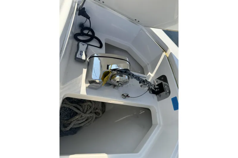 Slide: The Image of 2019 Sailfish 360 CC boat docked with triple Mercury engines. - 37