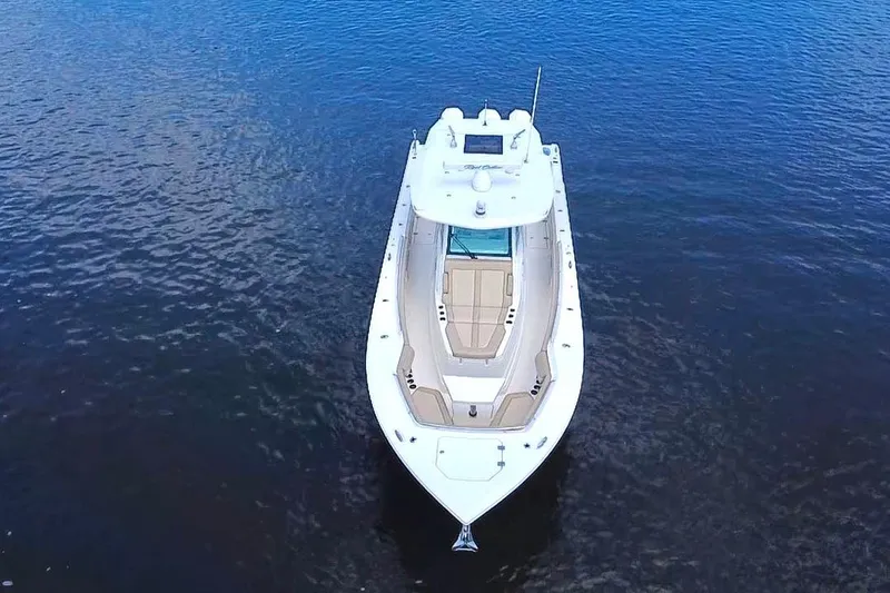 Slide: The Image of Aerial view of 2019 Sailfish 360 CC boat on calm water. - 4