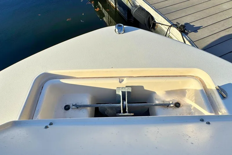 Slide: The Image of 2018 Grady-White Fisherman 216 boat anchor compartment at dock. - 20