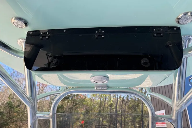 Slide: The Image of 2026 Key West 219 FS boat console with black panel and stainless steel frame. - 29