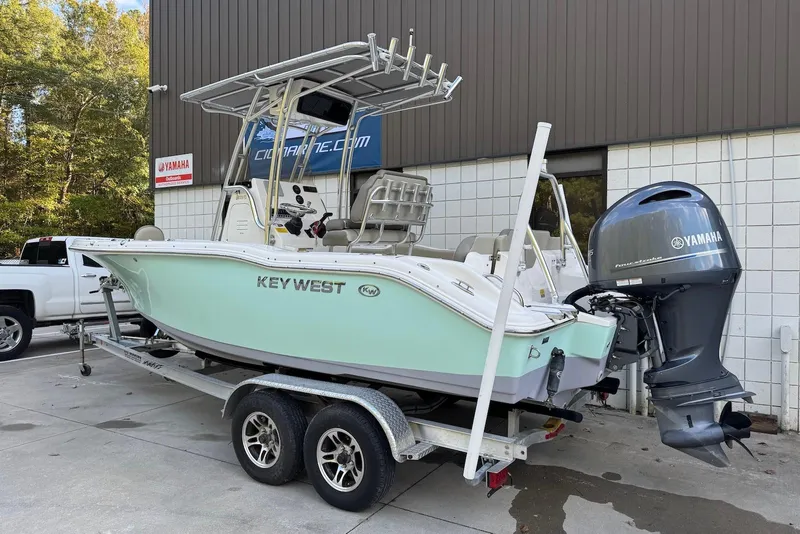 Slide: The Image of 2023 Key West 219 FS boat on trailer with Yamaha outboard motor. - 3