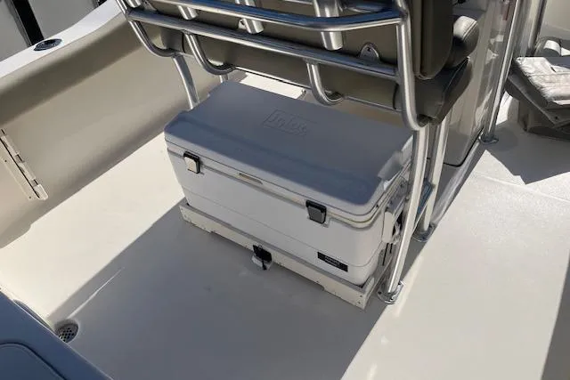 Slide: The Image of 2023 Key West 219 FS boat interior with cooler under seating. - 8