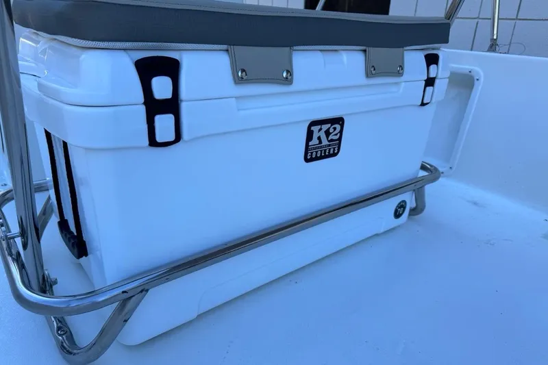 Slide: The Image of K2 cooler on 2026 Key West 1720 Center Console boat, featuring stainless steel frame. - 26