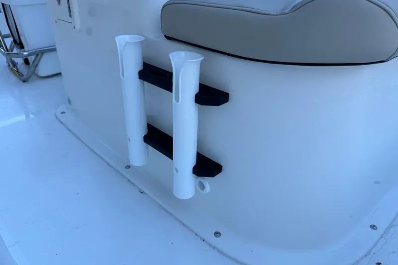 Slide: The Image of 2026 Key West 1720 Center Console boat interior with rod holders and seating. - 31