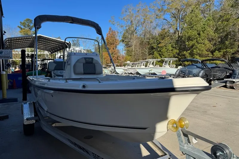 Slide: The Image of 2026 Key West 1720 Center Console boat on trailer at marina. - 5