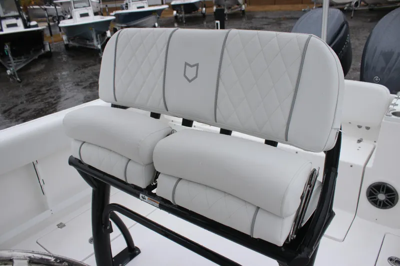 Slide: The Image of 2026 Sea Fox 268 Commander boat seating with quilted white upholstery. - 10