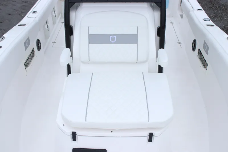 Slide: The Image of 2026 Sea Fox 268 Commander boat interior with white cushioned seating. - 15