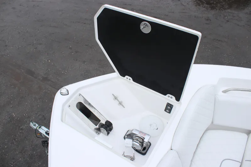 Slide: The Image of 2026 Sea Fox 268 Commander boat anchor compartment with open hatch and seating. - 16