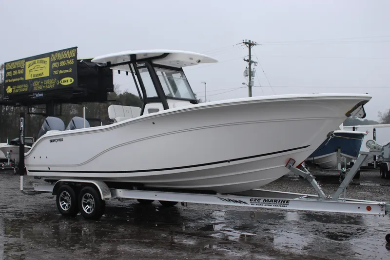 Slide: The Image of 2026 Sea Fox 268 Commander boat on trailer in outdoor setting. - 3