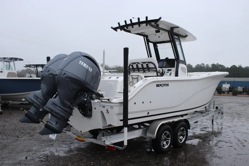 Slide: The Image of 2026 Sea Fox 268 Commander boat with dual Yamaha engines on a trailer. - 4