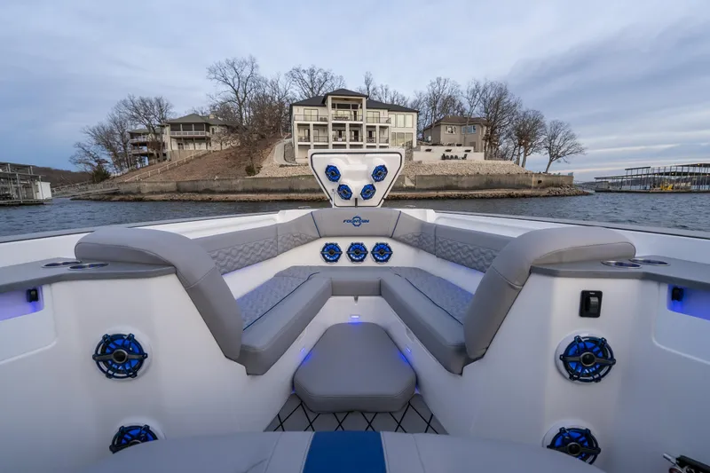 Slide: The Image of Luxurious 2026 Fountain 38 SCX boat interior with modern seating and waterfront view. - 12