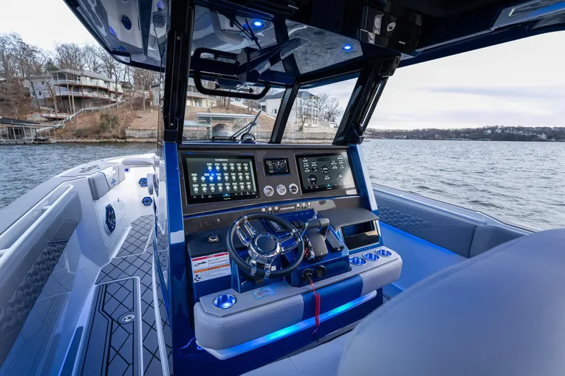 Slide: The Image of Interior view of 2026 Fountain 38 SCX boat with advanced navigation system. - 27