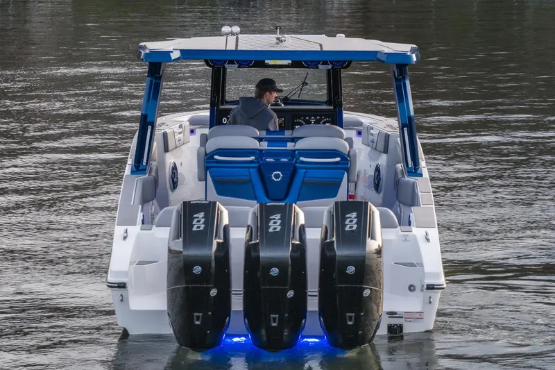 Slide: The Image of 2026 Fountain 38 SCX boat with triple 400 horsepower engines on water. - 8