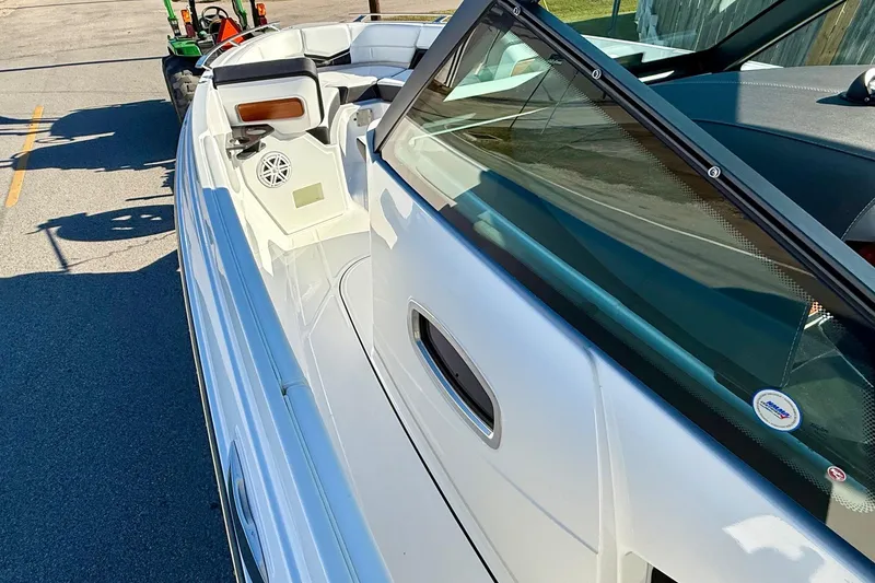 Slide: The Image of 2026 Monterey Elite 27 OB boat, side view with interior features. - 15