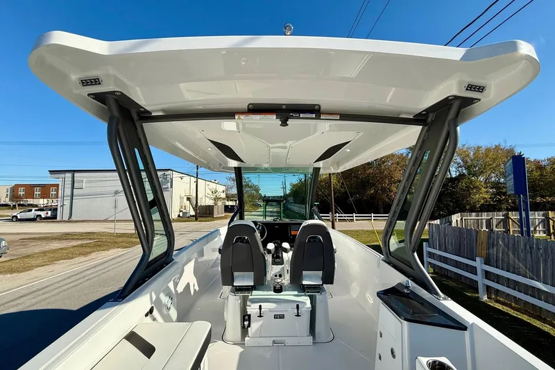 Slide: The Image of 2026 Monterey Elite 27 OB boat interior view. - 12