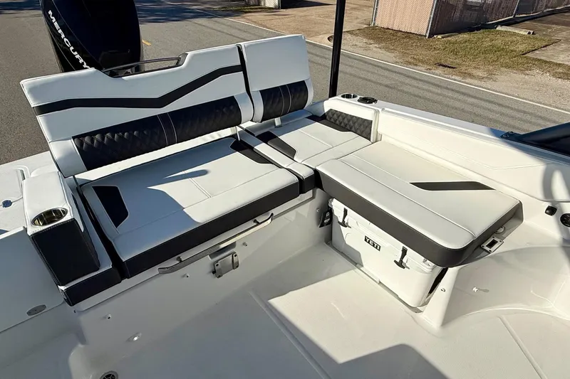 Slide: The Image of Interior of 2026 Monterey Elite 27 OB with seating and cooler. - 7