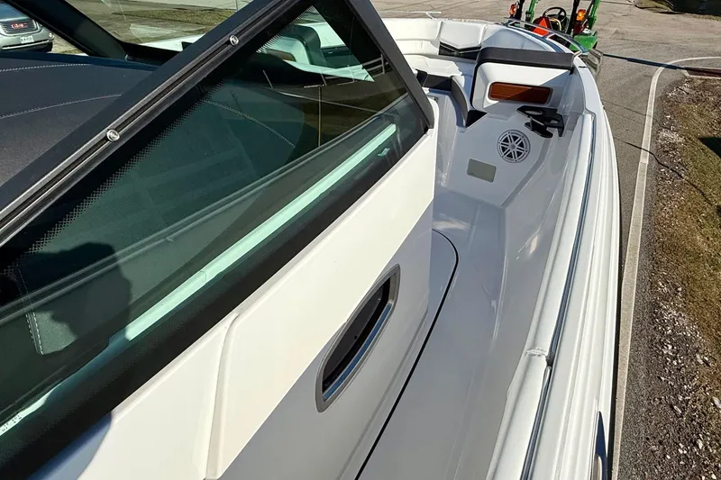 Slide: The Image of Monterey Elite 27 OB 2026, modern boat design, side view. - 17
