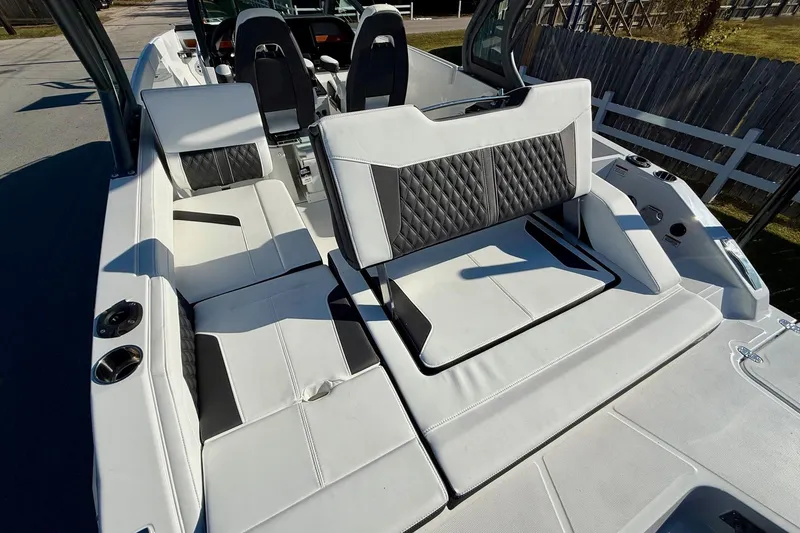 Slide: The Image of Interior of 2026 Monterey Elite 27 OB with luxurious seating. - 8