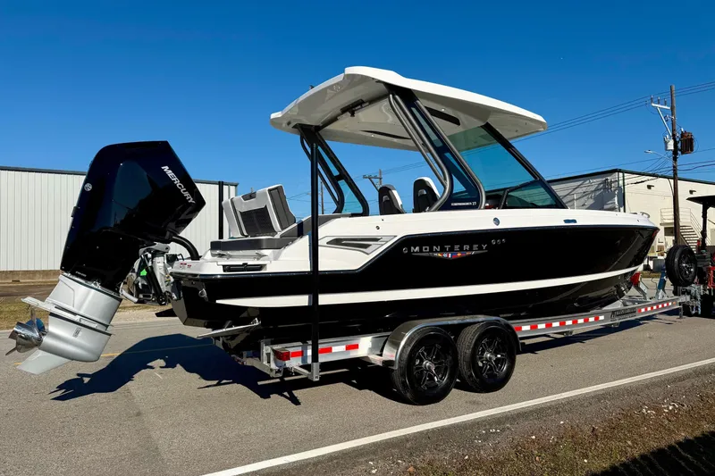 Slide: The Image of 2026 Monterey Elite 27 OB boat on trailer, side view. - 4