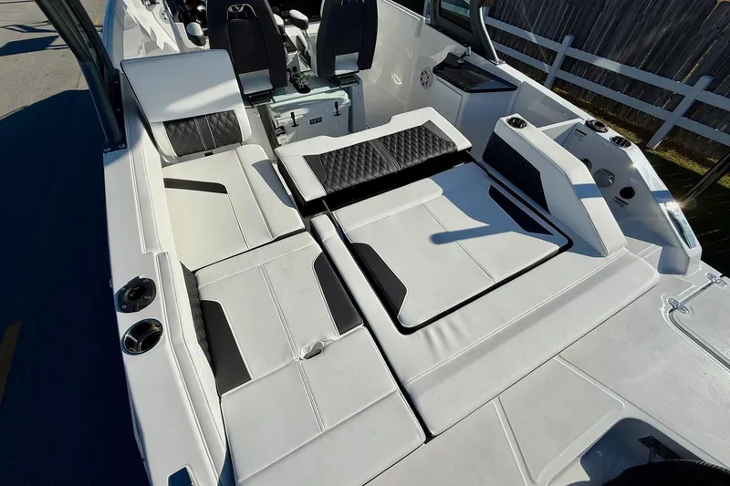 Slide: The Image of Interior of 2026 Monterey Elite 27 OB with luxurious seating. - 9