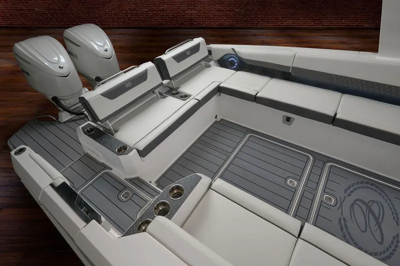 Slide: The Image of Manufacturer Provided Image: 2026 Cobalt R31 OB boat interior with dual engines and luxurious seating. - 4