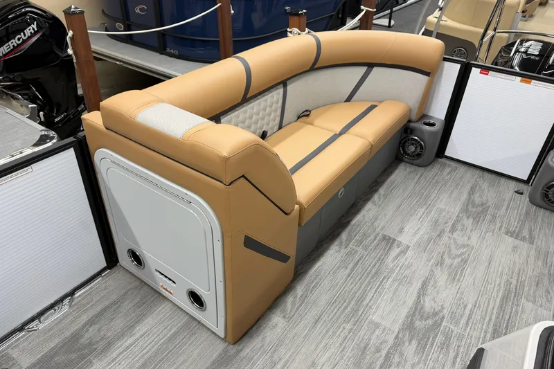 Slide: The Image of Luxurious seating on 2025 Crest Classic 220 boat, featuring tan upholstery and modern design. - 8