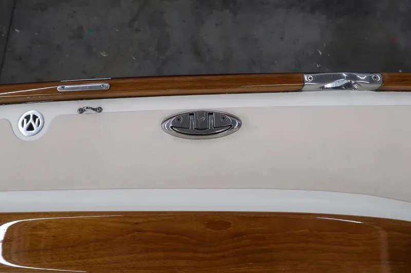 Slide: The Image of 2011 Morris M29 boat detail with wood finish and metal fixtures. - 12