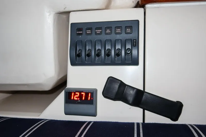 Slide: The Image of Control panel of a 2011 Morris M29 with voltage display reading 12.71 volts. - 23