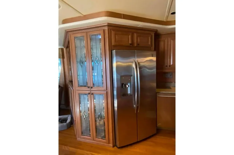 Slide: The Image of Wooden wine rack with bottles, Summerset 21' x 106', 2007 model. - 100