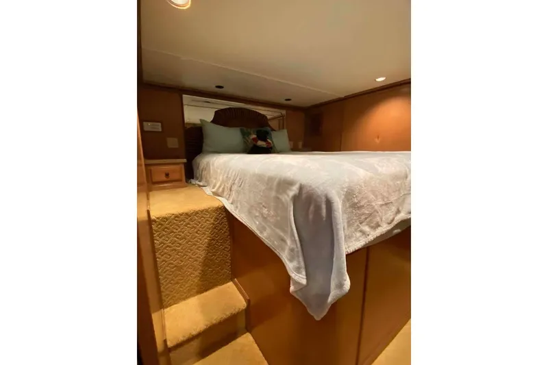 Slide: The Image of Wooden cabinet and stainless steel refrigerator in 2007 Summerset 21' x 106' interior. - 103