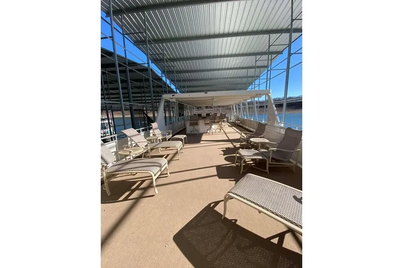 Slide: The Image of Narrow walkway on a 2007 Summerset houseboat, model 21' x 106', with shadows and railing. - 119