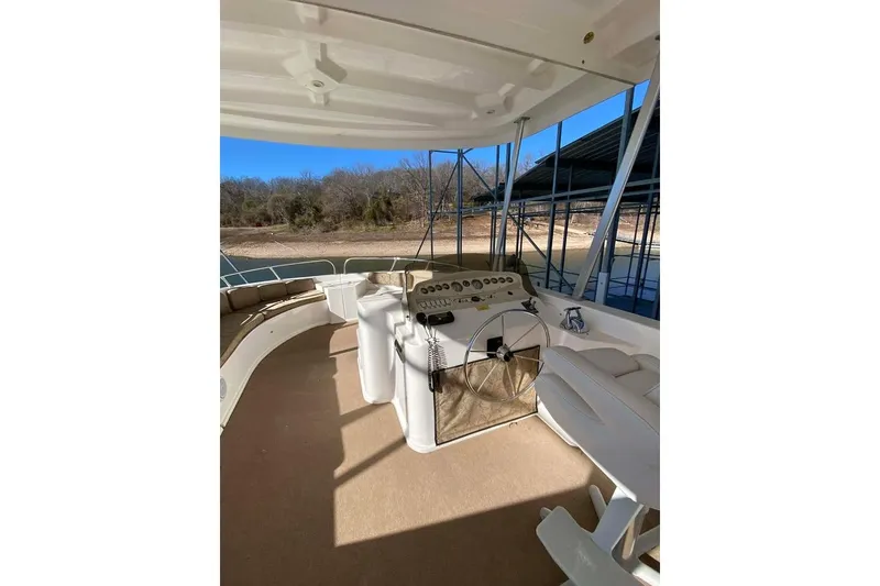 Slide: The Image of Outdoor seating on a Summerset houseboat, model 21' x 106', year 2007, with lake view. - 132