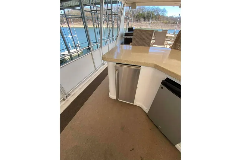 Slide: The Image of Luxurious Summerset houseboat interior with spacious kitchen and scenic water views, model 21' x 106', 2007. - 138